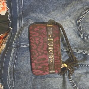 Purple leather leopard print by Juicy. Medium/large